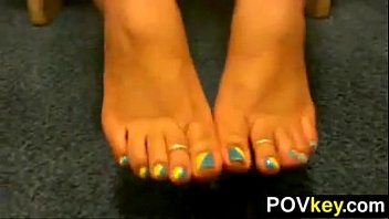 Pretty Girl Teasing Her Feet Close Up